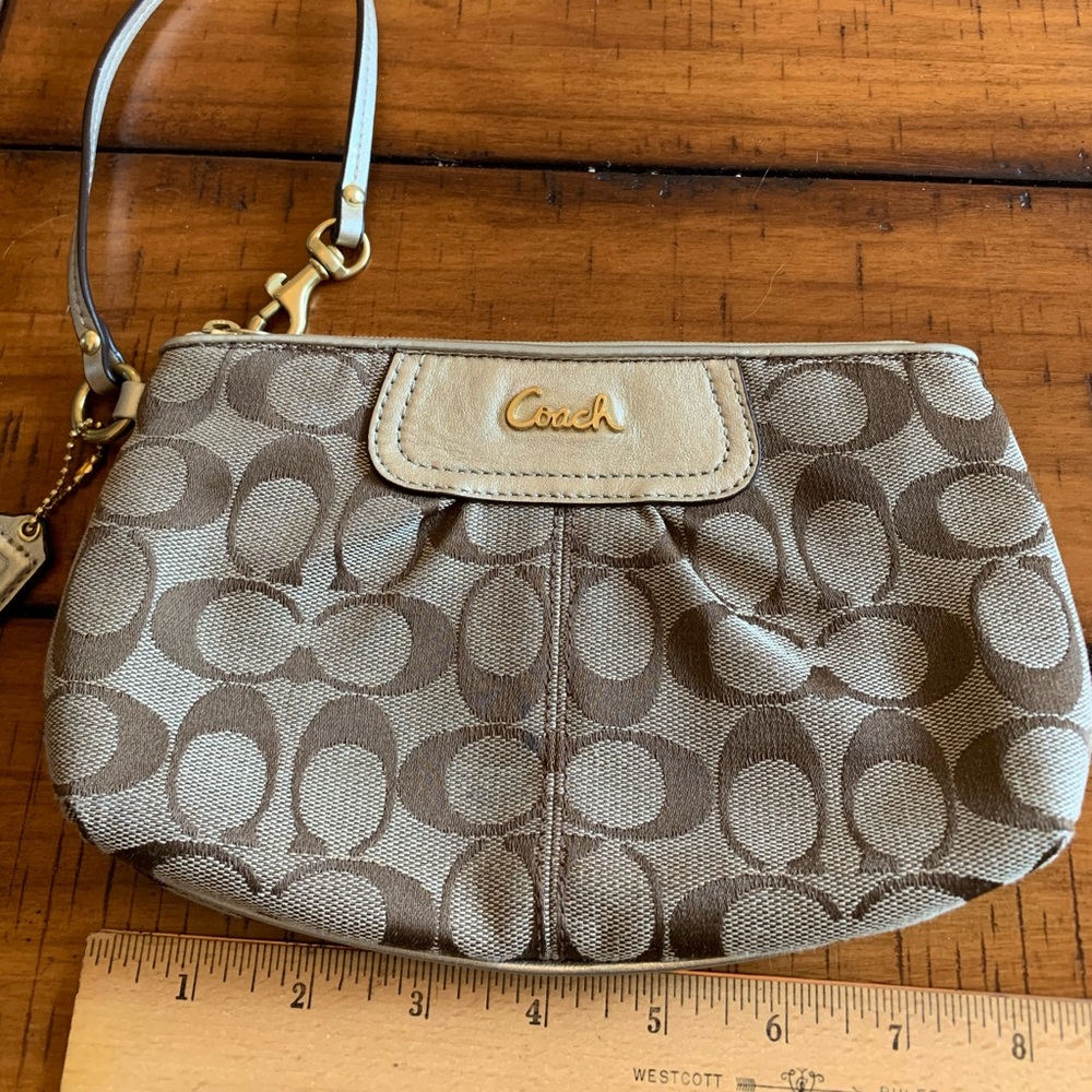 Tan coach wristlet